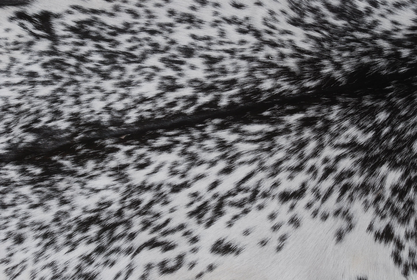 Authentic Black and White Goat Skin Rug - Perfect for Modern and Classic Décor