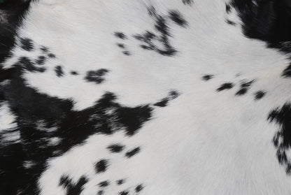 Stylish Black and White Goat Hide Rug - Unique Natural Pattern for Modern Homes